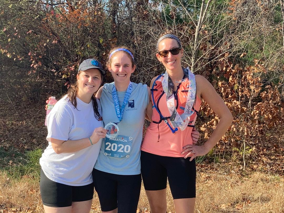A very tired smile with my awesome two running buddies (Taylor and Tara) who supported me during my half